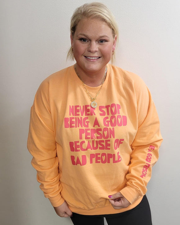 Never stop being a good person crewneck sweatshirt graphic